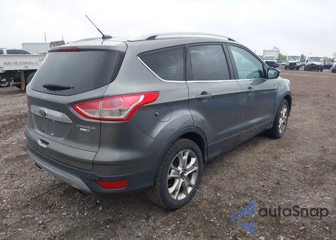 2014 Ford Escape Titanium z USA, uszkodzony, nr VIN 1FMCU9J94EUD53193